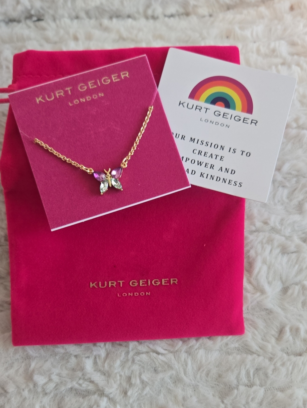 Kurt Geiger Gold Butterfly Necklace in Pink